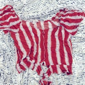 A stylish top from Gypsies and Moondust. It’s sized Large. Over the shoulder!